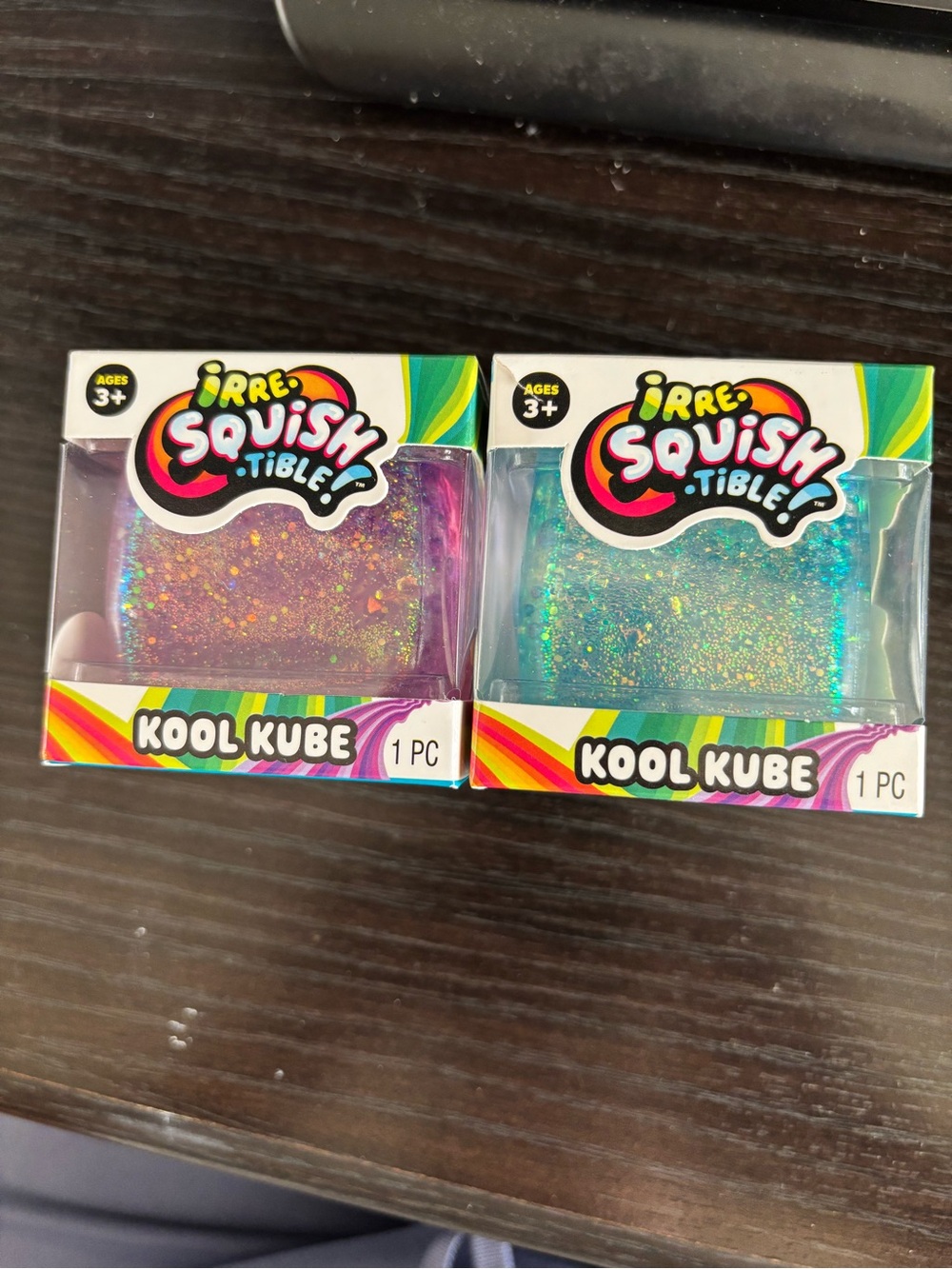 Irre.squish. Tible Kool Kube Glitter Squishy Toy - Pink & Teal